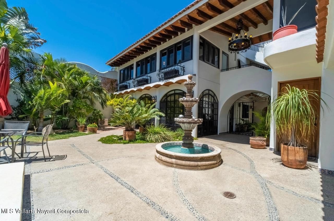 Hacienda Katherine Sayulita – Garden Front view of Hacienda Katherine Sayulita showcasing authentic Mexican architecture and tropical gardens
