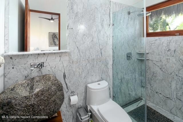 Modern Mexican interior design with marble floors and ocean breeze