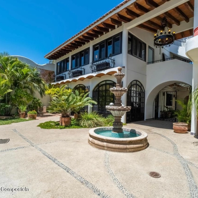 Front view of Hacienda Katherine Sayulita showcasing authentic Mexican architecture and tropical gardens