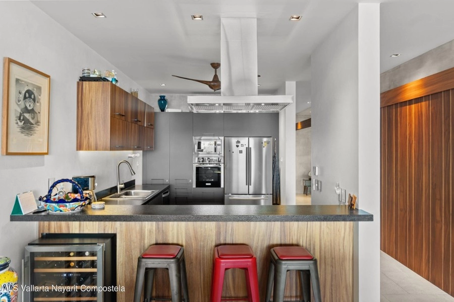 Fully equipped kitchen with ocean views and contemporary cabinetry
