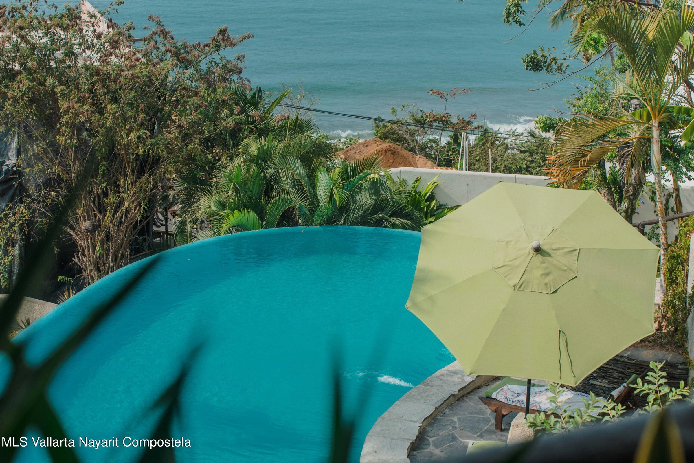 Ocean view terrace at Ajusko Monterrosa home for sale in North Side Sayulita Mexico