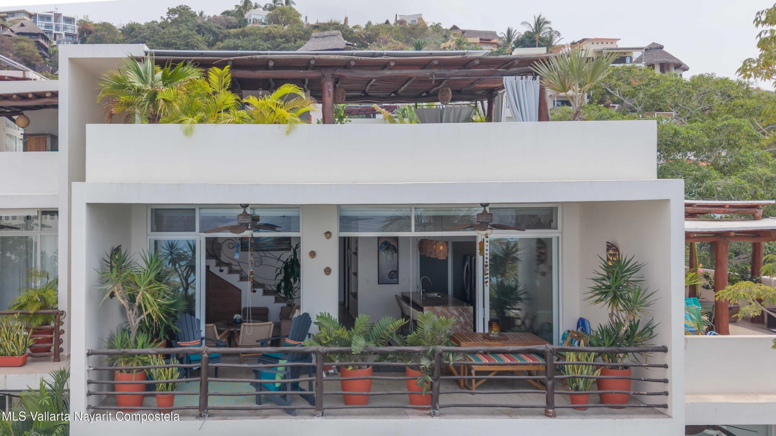 Ocean view terrace at Ajusko Monterrosa home for sale in North Side Sayulita Mexico