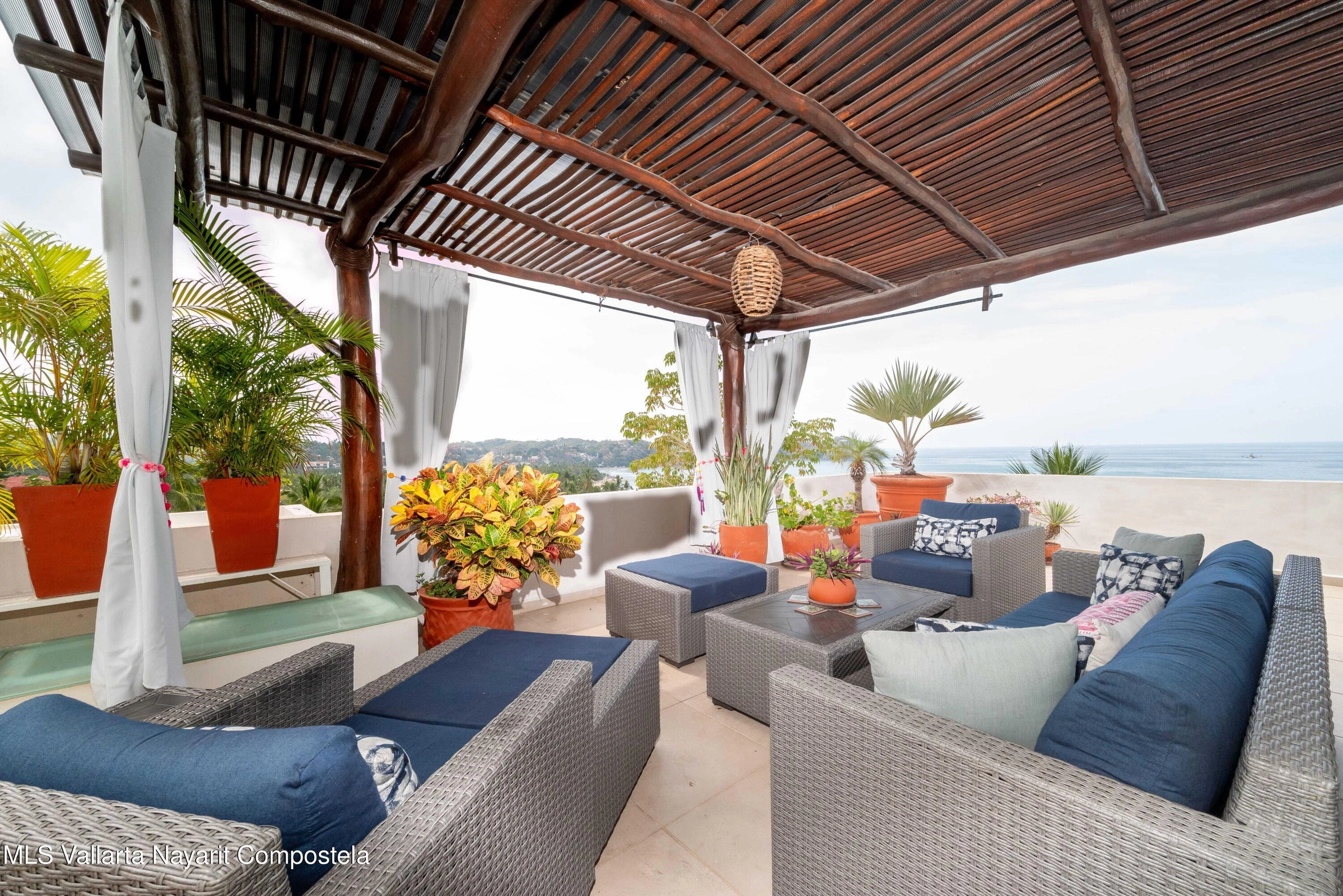Ocean view terrace at Ajusko Monterrosa home for sale in North Side Sayulita Mexico