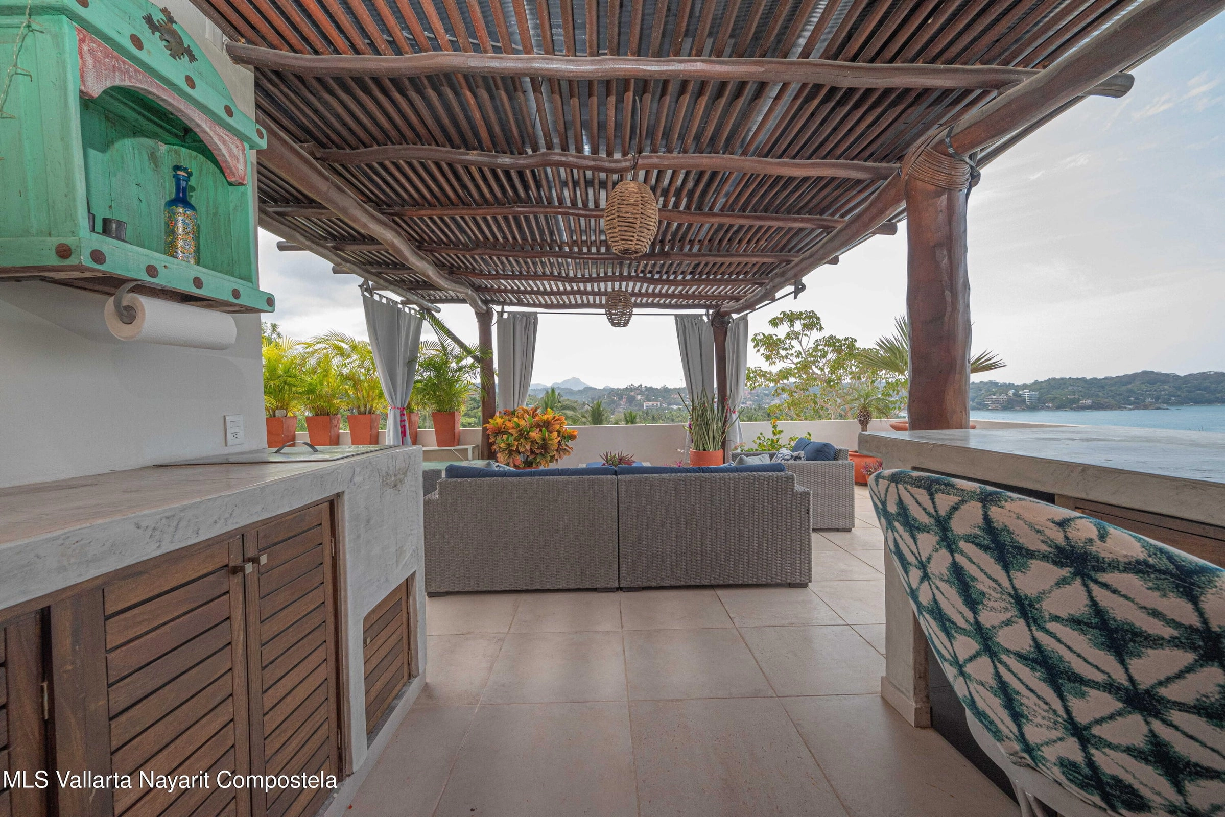 Ocean view terrace at Ajusko Monterrosa home for sale in North Side Sayulita Mexico