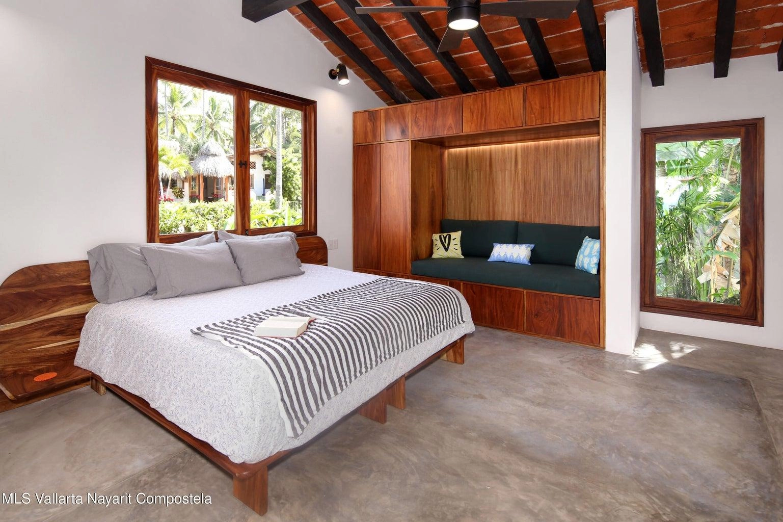 Casa Mirlo 12 Casa Mirlo is an exceptional Sayulita beachfront home for sale and one of the few true beachfront properties available in Sayulita. Offering unmatched location and privacy, this recently renovated three-bedroom residence sits just steps from the sand within the exclusive Las Gemelas complex, a boutique community of only six homes on the highly desirable north side of Sayulita. This rare Sayulita real estate opportunity features a modern chef’s kitchen, outdoor patio, cozy indoor terrace, interior fountain, lush gardens, and generous storage throughout. All three bedrooms include en suite bathrooms, providing comfort and privacy for both owners and guests. Located next to the pool and directly beachfront, Casa Mirlo offers immediate access to the ocean while remaining just a five-minute walk to the town center, restaurants, and main beach. As one of the limited beachfront homes in Sayulita, this property represents a unique opportunity for buyers seeking a Sayulita beachfront property, whether for a private residence, vacation home, or high-performing investment in the growing Sayulita real estate market.