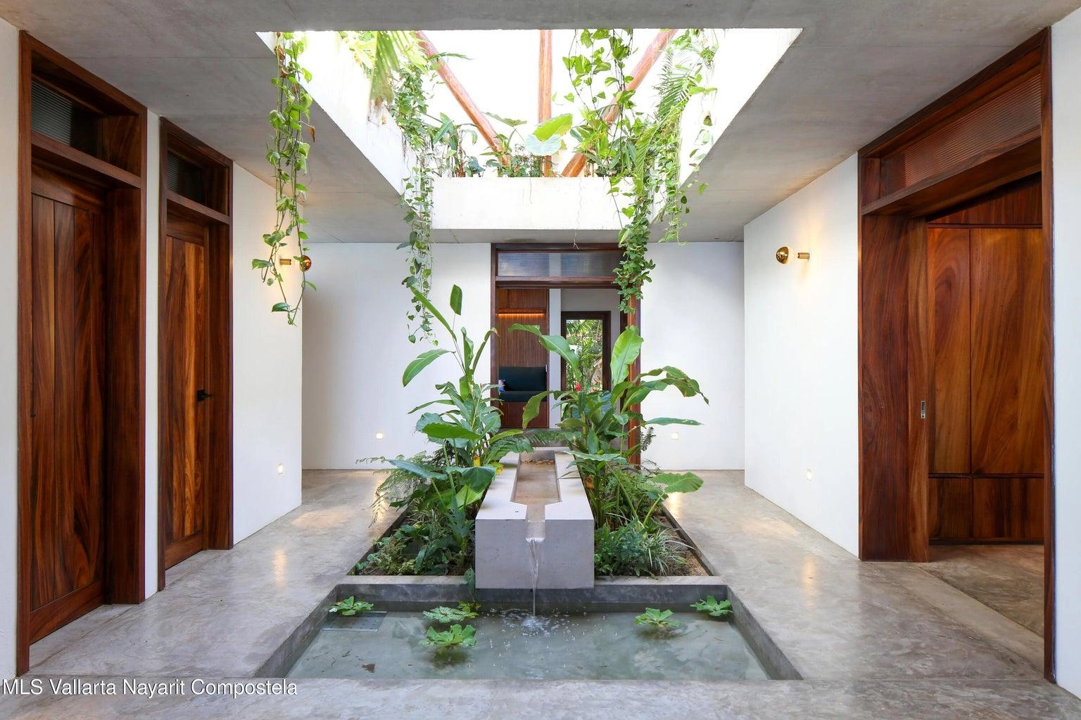 Casa Mirlo 13 Casa Mirlo is an exceptional Sayulita beachfront home for sale and one of the few true beachfront properties available in Sayulita. Offering unmatched location and privacy, this recently renovated three-bedroom residence sits just steps from the sand within the exclusive Las Gemelas complex, a boutique community of only six homes on the highly desirable north side of Sayulita. This rare Sayulita real estate opportunity features a modern chef’s kitchen, outdoor patio, cozy indoor terrace, interior fountain, lush gardens, and generous storage throughout. All three bedrooms include en suite bathrooms, providing comfort and privacy for both owners and guests. Located next to the pool and directly beachfront, Casa Mirlo offers immediate access to the ocean while remaining just a five-minute walk to the town center, restaurants, and main beach. As one of the limited beachfront homes in Sayulita, this property represents a unique opportunity for buyers seeking a Sayulita beachfront property, whether for a private residence, vacation home, or high-performing investment in the growing Sayulita real estate market.