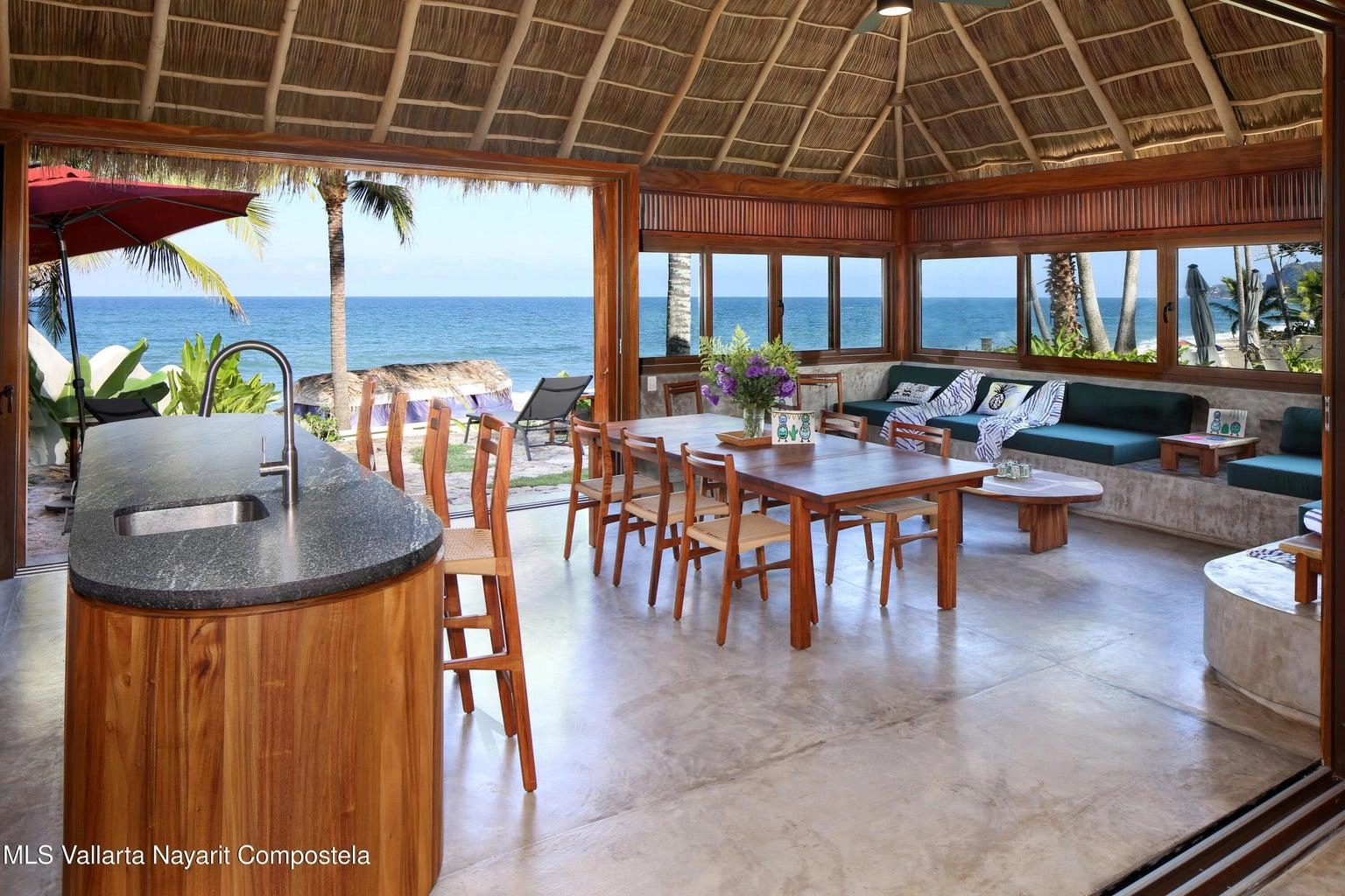 Casa Mirlo 18 Casa Mirlo is an exceptional Sayulita beachfront home for sale and one of the few true beachfront properties available in Sayulita. Offering unmatched location and privacy, this recently renovated three-bedroom residence sits just steps from the sand within the exclusive Las Gemelas complex, a boutique community of only six homes on the highly desirable north side of Sayulita. This rare Sayulita real estate opportunity features a modern chef’s kitchen, outdoor patio, cozy indoor terrace, interior fountain, lush gardens, and generous storage throughout. All three bedrooms include en suite bathrooms, providing comfort and privacy for both owners and guests. Located next to the pool and directly beachfront, Casa Mirlo offers immediate access to the ocean while remaining just a five-minute walk to the town center, restaurants, and main beach. As one of the limited beachfront homes in Sayulita, this property represents a unique opportunity for buyers seeking a Sayulita beachfront property, whether for a private residence, vacation home, or high-performing investment in the growing Sayulita real estate market.