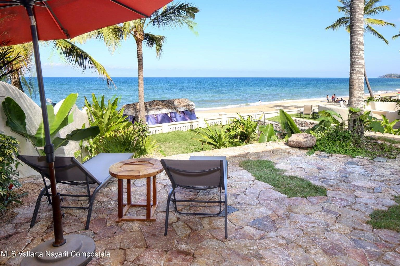 Casa Mirlo 19 Casa Mirlo is an exceptional Sayulita beachfront home for sale and one of the few true beachfront properties available in Sayulita. Offering unmatched location and privacy, this recently renovated three-bedroom residence sits just steps from the sand within the exclusive Las Gemelas complex, a boutique community of only six homes on the highly desirable north side of Sayulita. This rare Sayulita real estate opportunity features a modern chef’s kitchen, outdoor patio, cozy indoor terrace, interior fountain, lush gardens, and generous storage throughout. All three bedrooms include en suite bathrooms, providing comfort and privacy for both owners and guests. Located next to the pool and directly beachfront, Casa Mirlo offers immediate access to the ocean while remaining just a five-minute walk to the town center, restaurants, and main beach. As one of the limited beachfront homes in Sayulita, this property represents a unique opportunity for buyers seeking a Sayulita beachfront property, whether for a private residence, vacation home, or high-performing investment in the growing Sayulita real estate market.