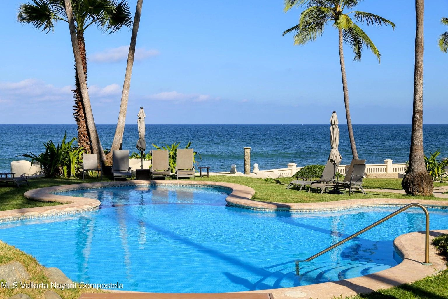 Casa Mirlo 21 Casa Mirlo is an exceptional Sayulita beachfront home for sale and one of the few true beachfront properties available in Sayulita. Offering unmatched location and privacy, this recently renovated three-bedroom residence sits just steps from the sand within the exclusive Las Gemelas complex, a boutique community of only six homes on the highly desirable north side of Sayulita. This rare Sayulita real estate opportunity features a modern chef’s kitchen, outdoor patio, cozy indoor terrace, interior fountain, lush gardens, and generous storage throughout. All three bedrooms include en suite bathrooms, providing comfort and privacy for both owners and guests. Located next to the pool and directly beachfront, Casa Mirlo offers immediate access to the ocean while remaining just a five-minute walk to the town center, restaurants, and main beach. As one of the limited beachfront homes in Sayulita, this property represents a unique opportunity for buyers seeking a Sayulita beachfront property, whether for a private residence, vacation home, or high-performing investment in the growing Sayulita real estate market.