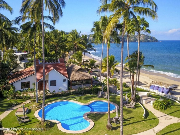 Casa Mirlo is an exceptional Sayulita beachfront home for sale and one of the few true beachfront properties available in Sayulita. Offering unmatched location and privacy, this recently renovated three-bedroom residence sits just steps from the sand within the exclusive Las Gemelas complex, a boutique community of only six homes on the highly desirable north side of Sayulita. This rare Sayulita real estate opportunity features a modern chef’s kitchen, outdoor patio, cozy indoor terrace, interior fountain, lush gardens, and generous storage throughout. All three bedrooms include en suite bathrooms, providing comfort and privacy for both owners and guests. Located next to the pool and directly beachfront, Casa Mirlo offers immediate access to the ocean while remaining just a five-minute walk to the town center, restaurants, and main beach. As one of the limited beachfront homes in Sayulita, this property represents a unique opportunity for buyers seeking a Sayulita beachfront property, whether for a private residence, vacation home, or high-performing investment in the growing Sayulita real estate market.