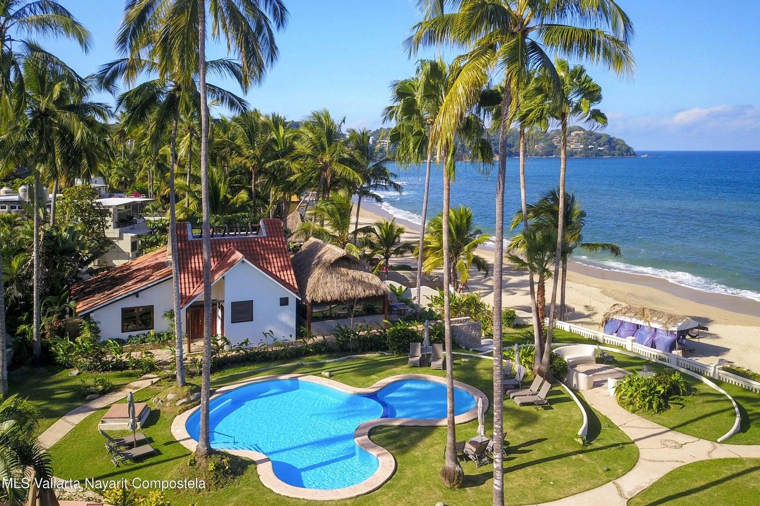 Casa Mirlo 3 Casa Mirlo is an exceptional Sayulita beachfront home for sale and one of the few true beachfront properties available in Sayulita. Offering unmatched location and privacy, this recently renovated three-bedroom residence sits just steps from the sand within the exclusive Las Gemelas complex, a boutique community of only six homes on the highly desirable north side of Sayulita. This rare Sayulita real estate opportunity features a modern chef’s kitchen, outdoor patio, cozy indoor terrace, interior fountain, lush gardens, and generous storage throughout. All three bedrooms include en suite bathrooms, providing comfort and privacy for both owners and guests. Located next to the pool and directly beachfront, Casa Mirlo offers immediate access to the ocean while remaining just a five-minute walk to the town center, restaurants, and main beach. As one of the limited beachfront homes in Sayulita, this property represents a unique opportunity for buyers seeking a Sayulita beachfront property, whether for a private residence, vacation home, or high-performing investment in the growing Sayulita real estate market.
