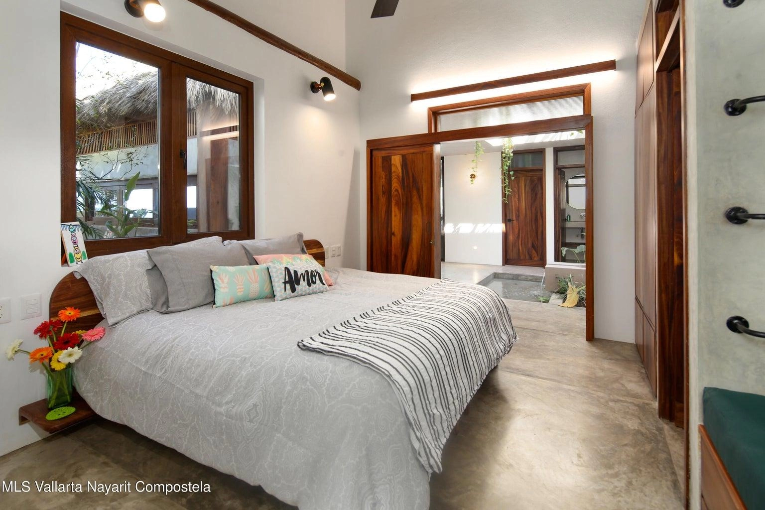 Casa Mirlo 6 Casa Mirlo is an exceptional Sayulita beachfront home for sale and one of the few true beachfront properties available in Sayulita. Offering unmatched location and privacy, this recently renovated three-bedroom residence sits just steps from the sand within the exclusive Las Gemelas complex, a boutique community of only six homes on the highly desirable north side of Sayulita. This rare Sayulita real estate opportunity features a modern chef’s kitchen, outdoor patio, cozy indoor terrace, interior fountain, lush gardens, and generous storage throughout. All three bedrooms include en suite bathrooms, providing comfort and privacy for both owners and guests. Located next to the pool and directly beachfront, Casa Mirlo offers immediate access to the ocean while remaining just a five-minute walk to the town center, restaurants, and main beach. As one of the limited beachfront homes in Sayulita, this property represents a unique opportunity for buyers seeking a Sayulita beachfront property, whether for a private residence, vacation home, or high-performing investment in the growing Sayulita real estate market.