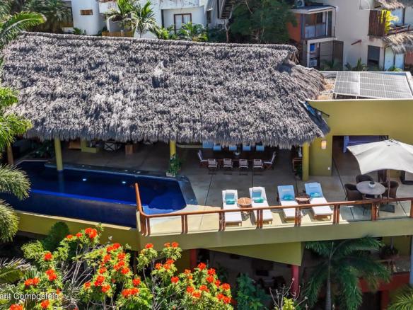 “Gourmet kitchen inside luxury Sayulita home for sale with open-concept design and modern finishes.
