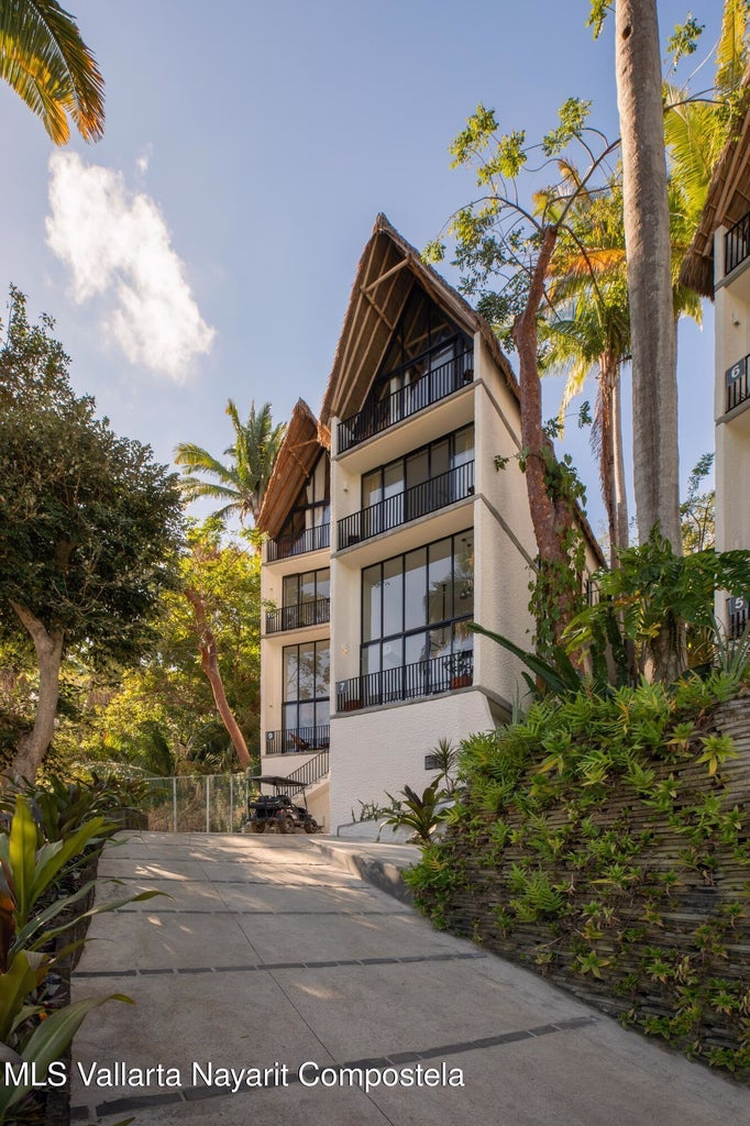 2 bedroom condo for sale in Sayulita Mexico with ocean views and palapa roof