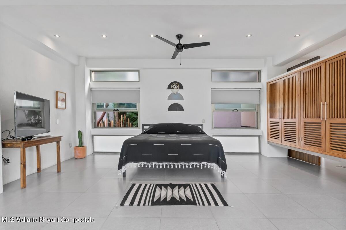 Modern luxury villa in Sayulita with panoramic Pacific Ocean views and contemporary concrete architecture.