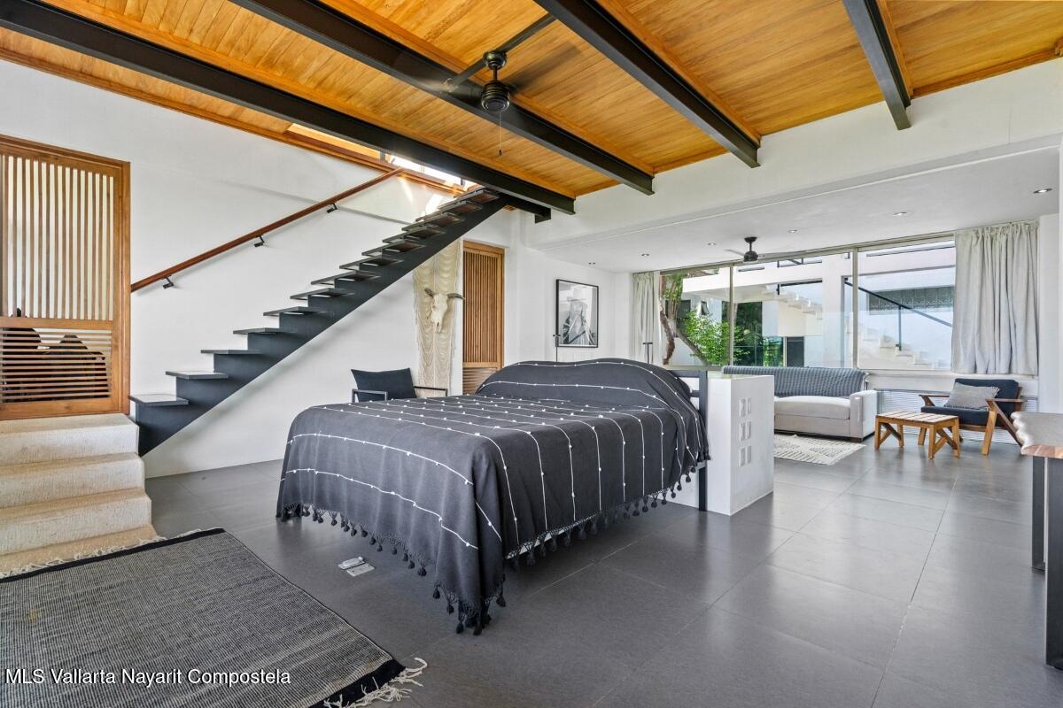 Modern luxury villa in Sayulita with panoramic Pacific Ocean views and contemporary concrete architecture.
