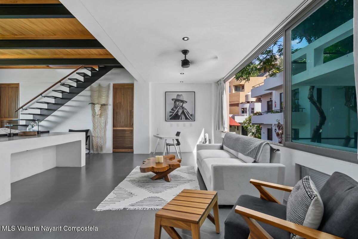 Modern luxury villa in Sayulita with panoramic Pacific Ocean views and contemporary concrete architecture.