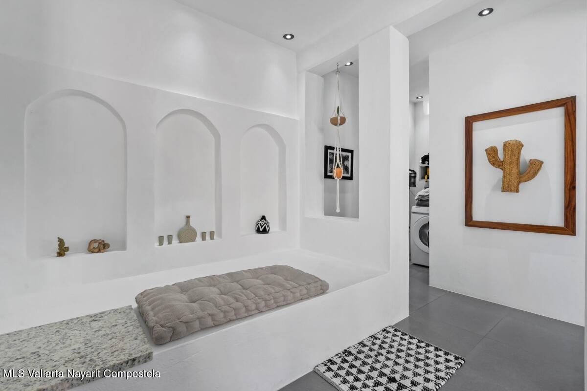 Modern luxury villa in Sayulita with panoramic Pacific Ocean views and contemporary concrete architecture.