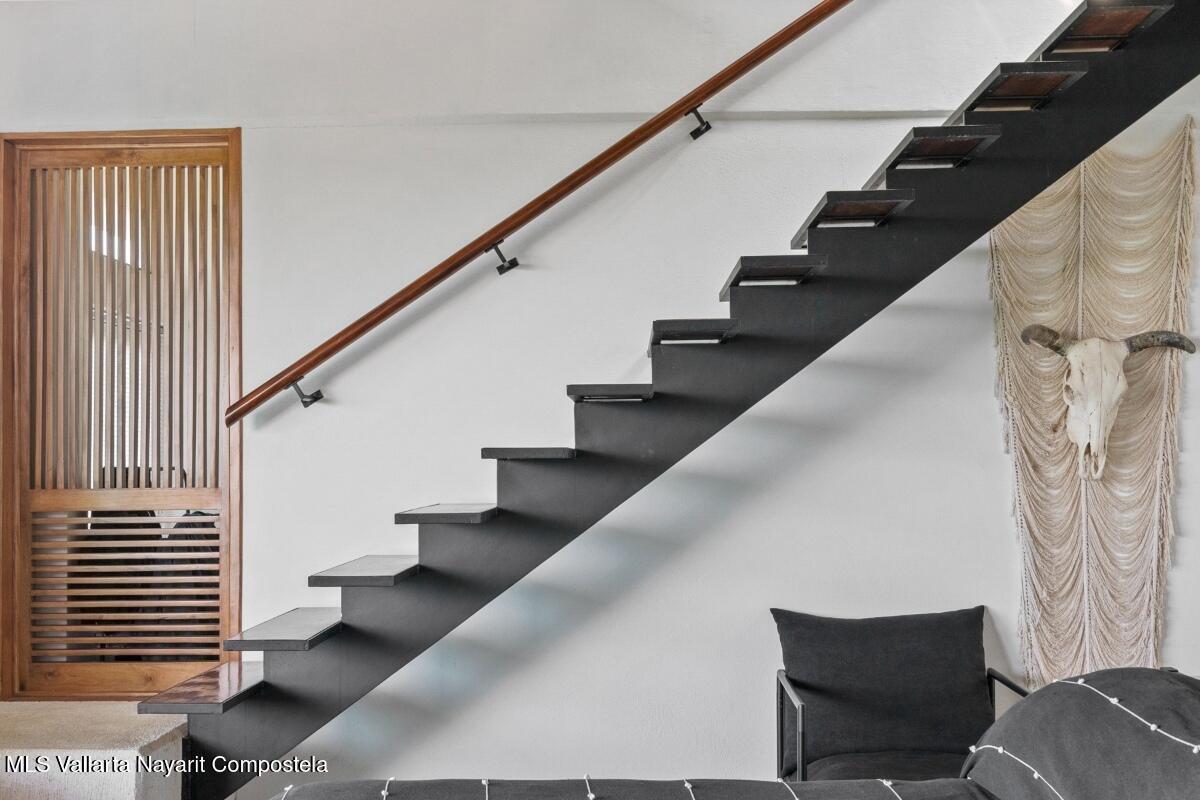 Modern luxury villa in Sayulita with panoramic Pacific Ocean views and contemporary concrete architecture.