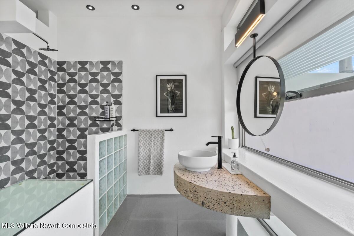 Modern luxury villa in Sayulita with panoramic Pacific Ocean views and contemporary concrete architecture.