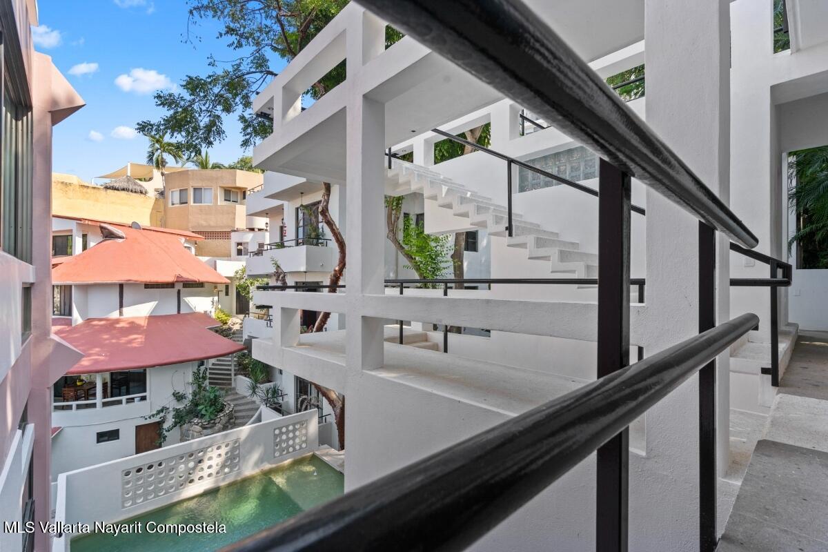 Modern luxury villa in Sayulita with panoramic Pacific Ocean views and contemporary concrete architecture.