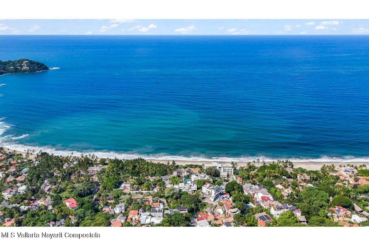 Modern luxury villa in Sayulita with panoramic Pacific Ocean views and contemporary concrete architecture.