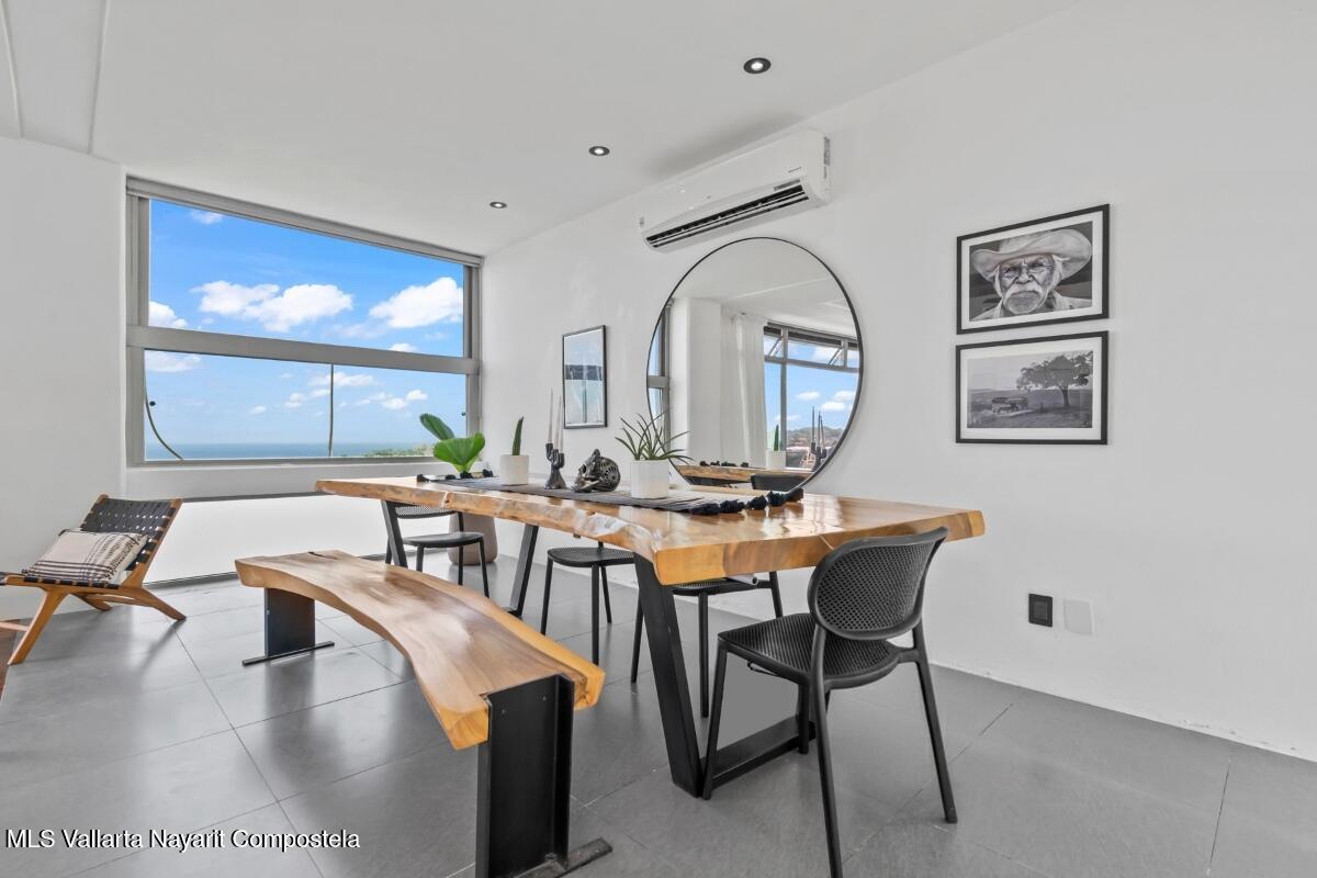 Modern luxury villa in Sayulita with panoramic Pacific Ocean views and contemporary concrete architecture.