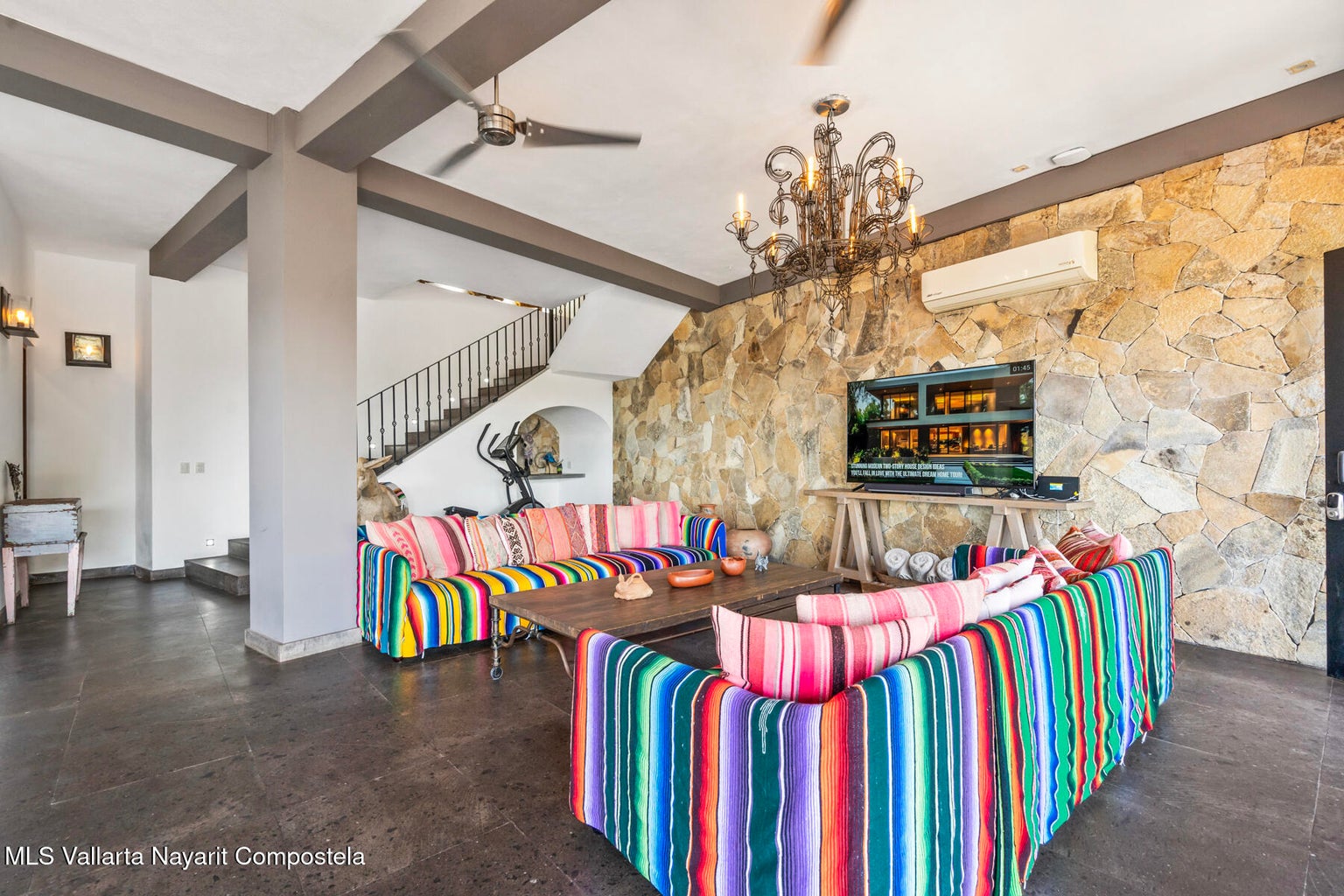 Luxury ocean view home for sale in Nanzal Hill, Sayulita featuring panoramic Pacific Ocean views, tropical landscaping, saltwater pool, rooftop terrace, gourmet kitchen, and elegant indoor-outdoor coastal living in Riviera Nayarit.