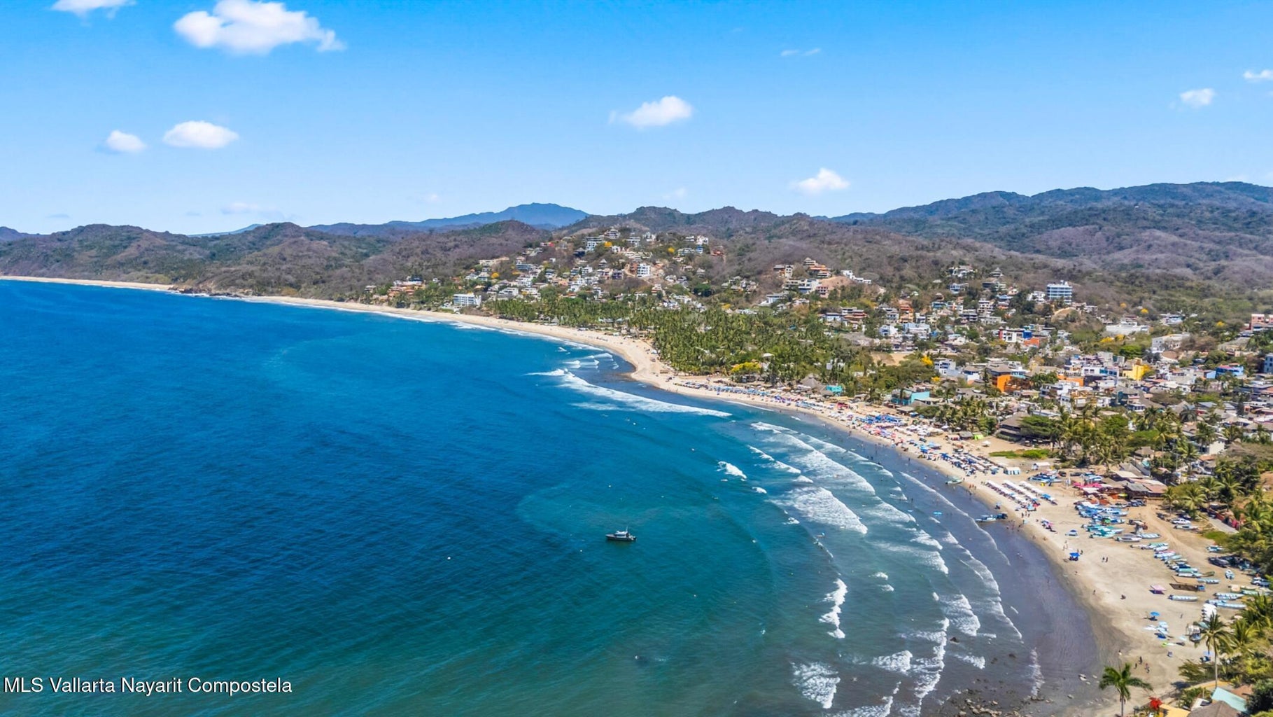 Luxury ocean view home for sale in Nanzal Hill, Sayulita featuring panoramic Pacific Ocean views, tropical landscaping, saltwater pool, rooftop terrace, gourmet kitchen, and elegant indoor-outdoor coastal living in Riviera Nayarit.