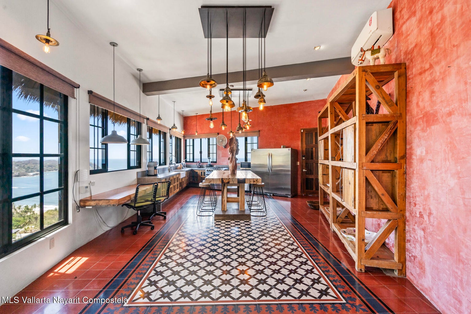 Luxury ocean view home for sale in Nanzal Hill, Sayulita featuring panoramic Pacific Ocean views, tropical landscaping, saltwater pool, rooftop terrace, gourmet kitchen, and elegant indoor-outdoor coastal living in Riviera Nayarit.
