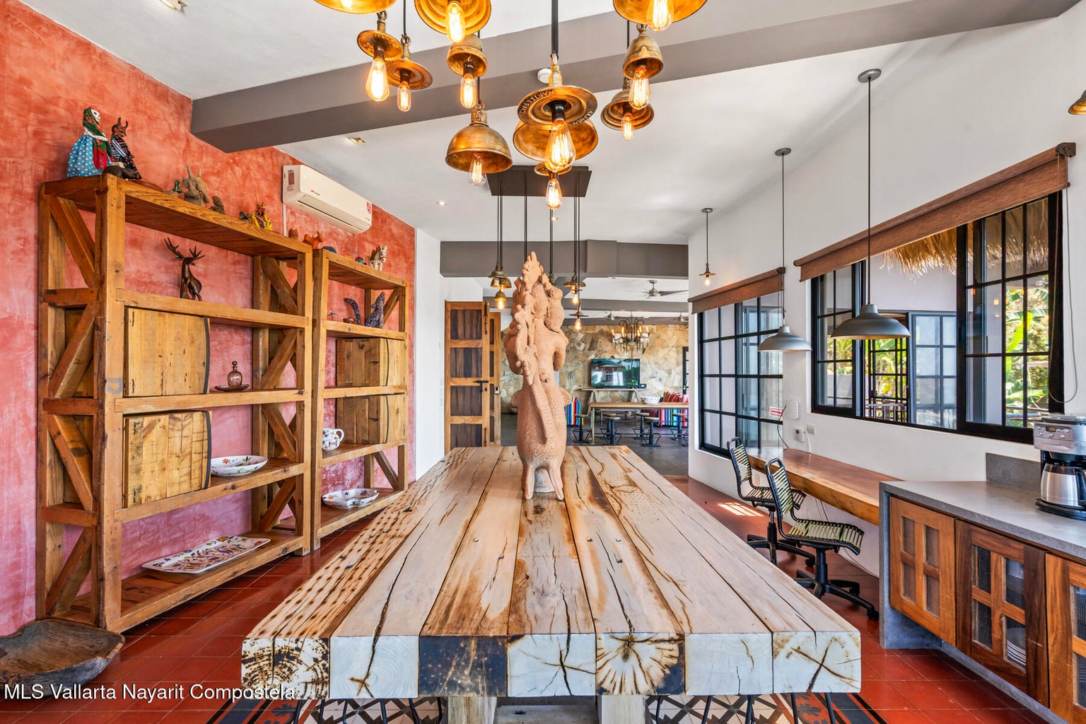 Luxury ocean view home for sale in Nanzal Hill, Sayulita featuring panoramic Pacific Ocean views, tropical landscaping, saltwater pool, rooftop terrace, gourmet kitchen, and elegant indoor-outdoor coastal living in Riviera Nayarit.
