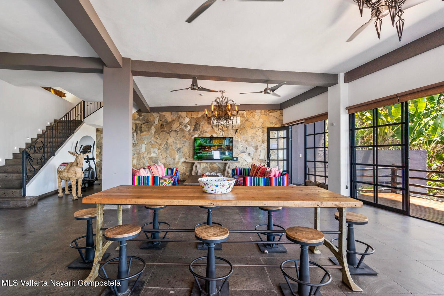 Luxury ocean view home for sale in Nanzal Hill, Sayulita featuring panoramic Pacific Ocean views, tropical landscaping, saltwater pool, rooftop terrace, gourmet kitchen, and elegant indoor-outdoor coastal living in Riviera Nayarit.