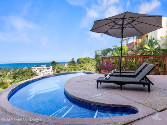 Ocean view home in Sayulita North End with tropical architecture and multiple terraces.