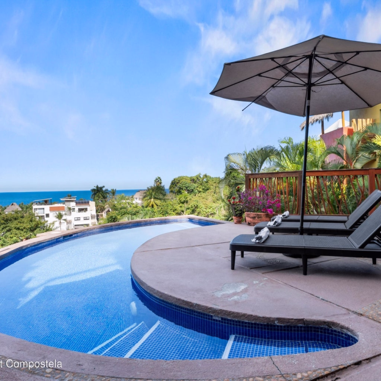 Ocean view home in Sayulita North End with tropical architecture and multiple terraces.