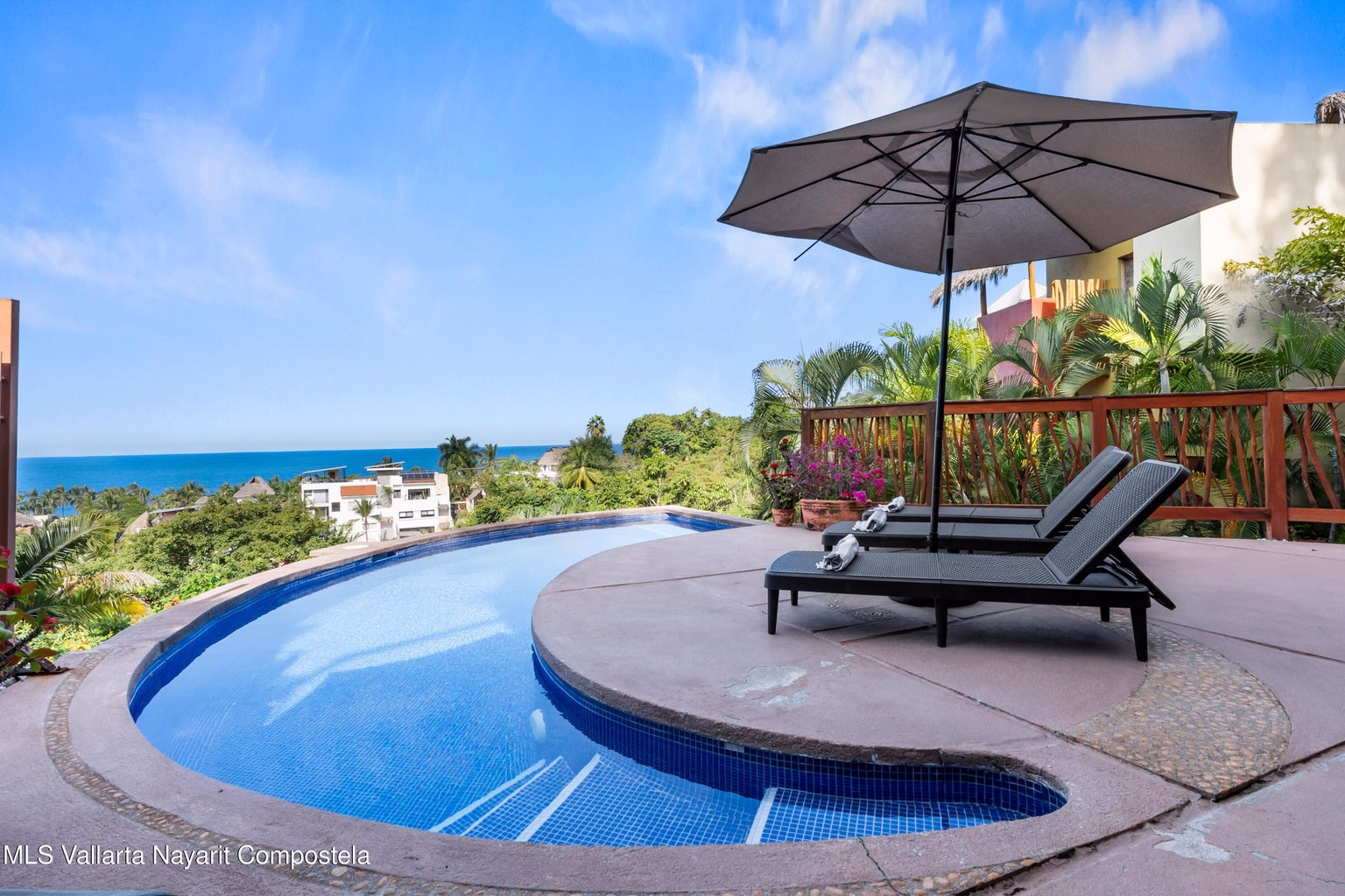 Ocean view home in Sayulita North End with tropical architecture and multiple terraces.