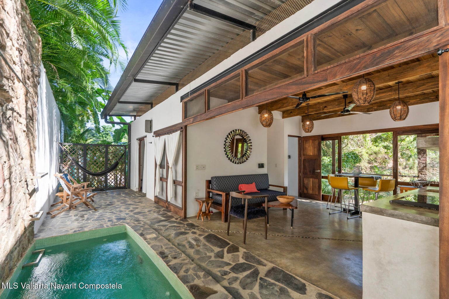 Modern jungle retreat in Sayulita surrounded by tropical parota trees