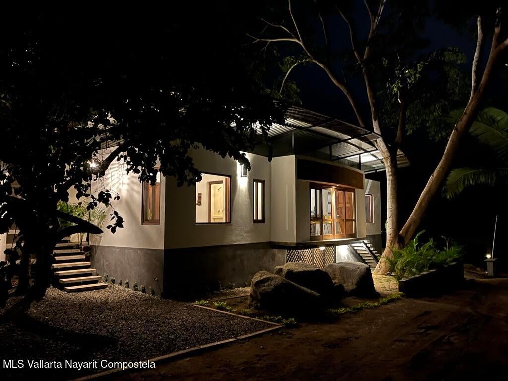 Modern jungle retreat in Sayulita surrounded by tropical parota trees