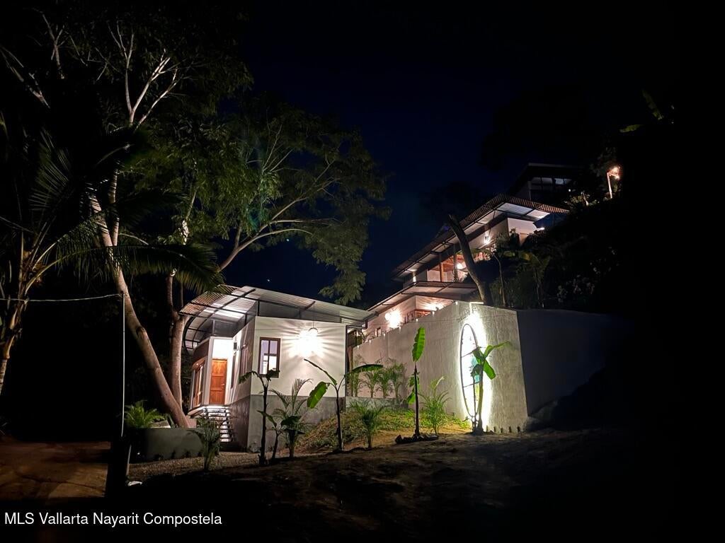 Modern jungle retreat in Sayulita surrounded by tropical parota trees