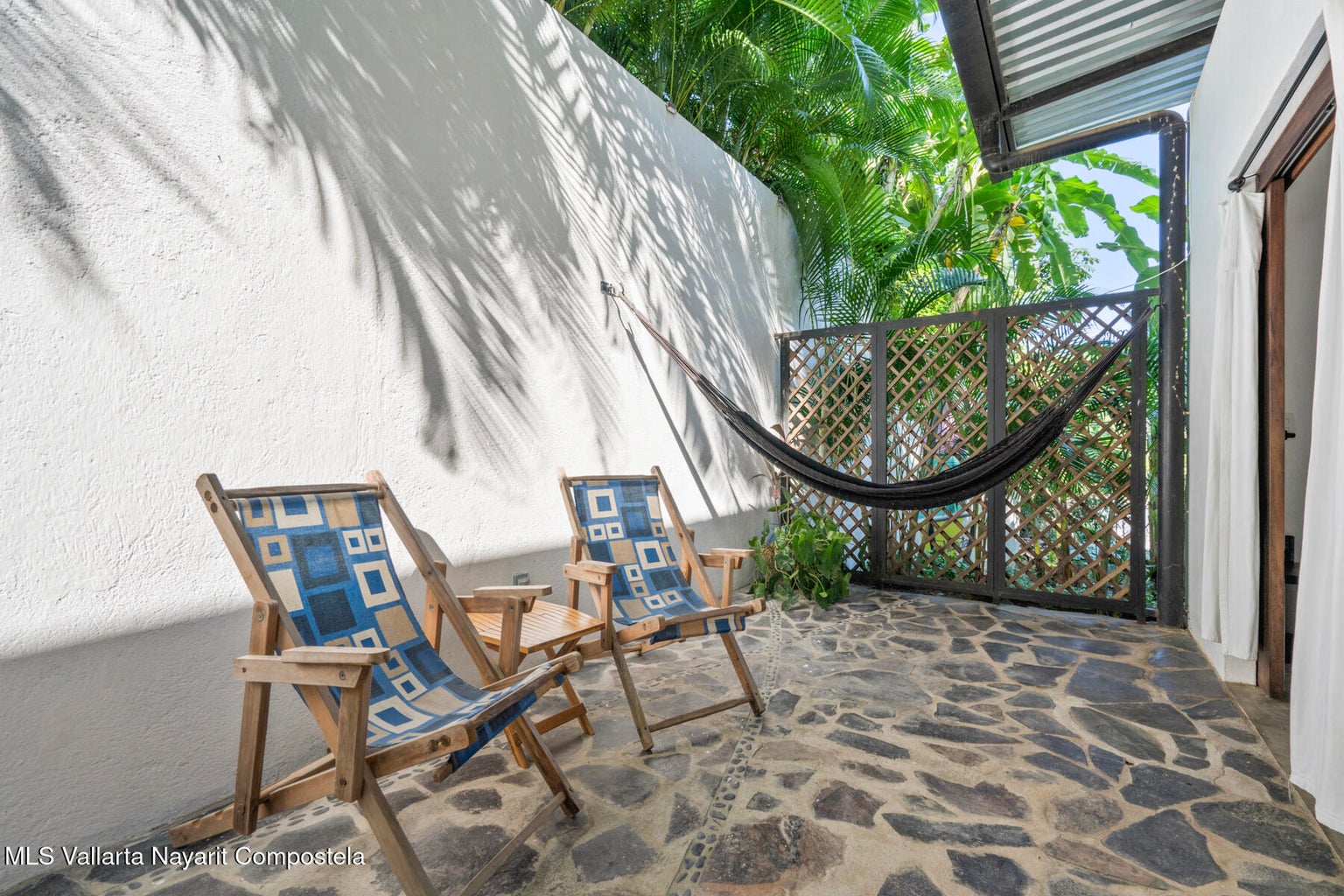 Modern jungle retreat in Sayulita surrounded by tropical parota trees