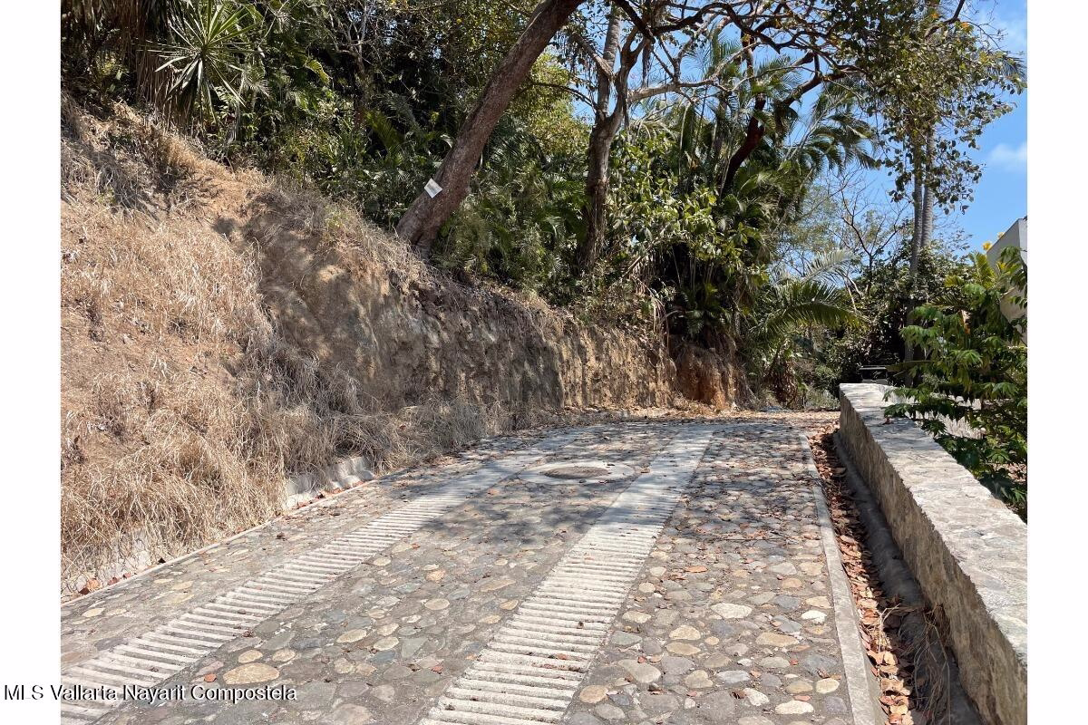 Residential lots for sale on Gringo Hill in Sayulita with utility infrastructure, private road access, and hillside building sites near downtown.