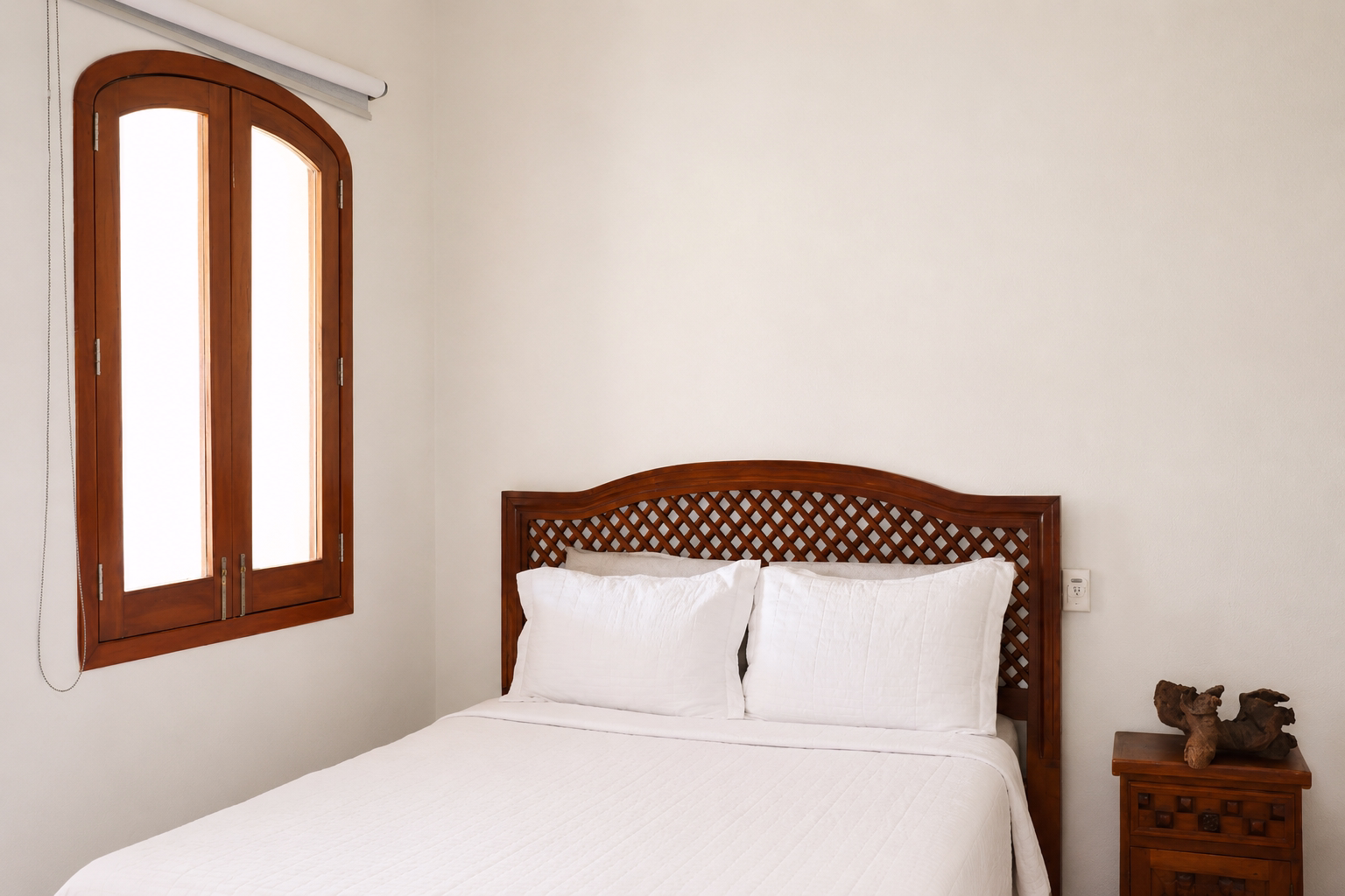 Bedroom with two queen beds at Casa Nichos